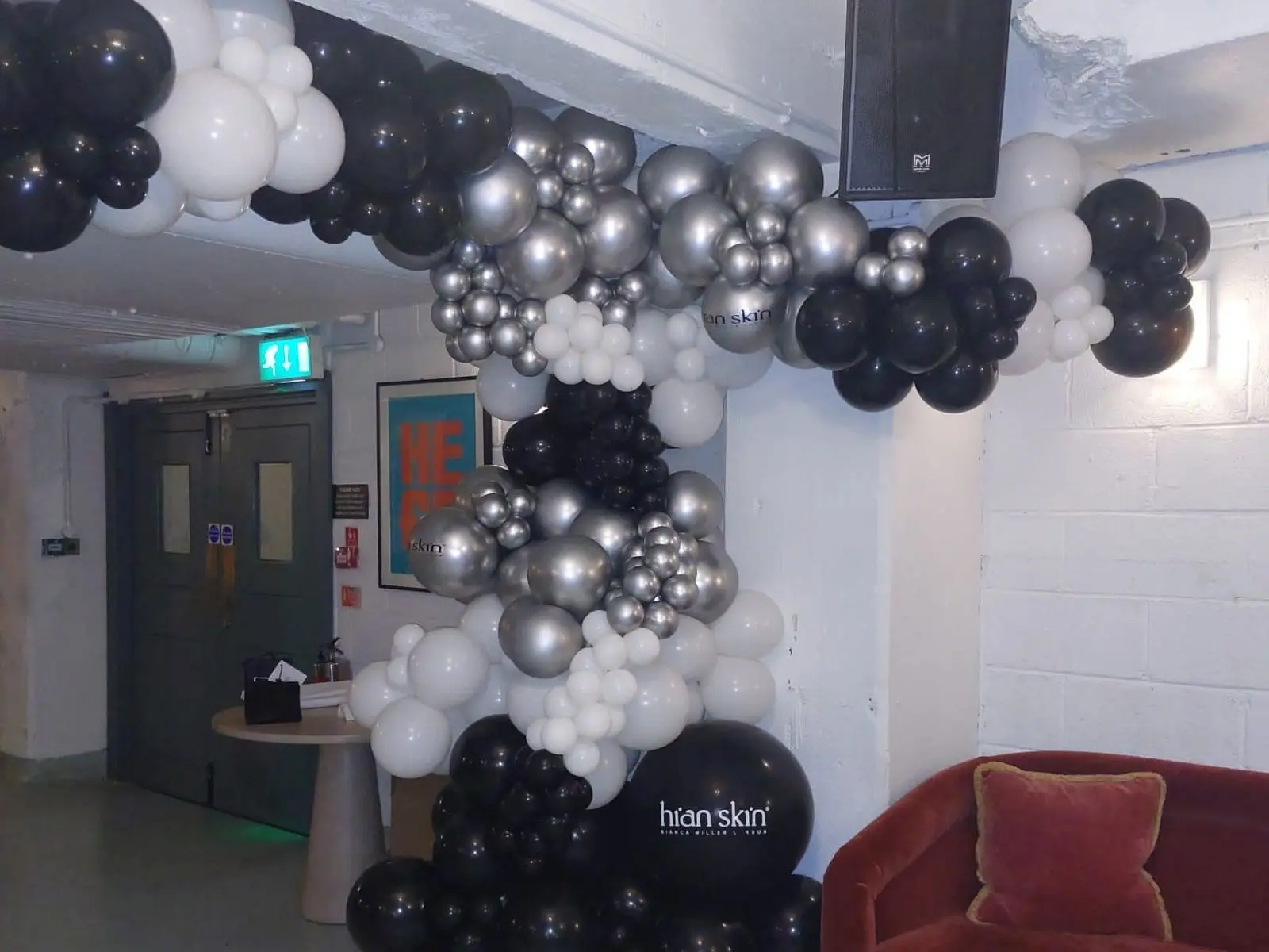 Black, white and silver statement balloon installation for a product launch